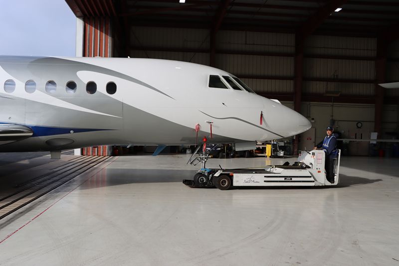 Private jet entering hangar
