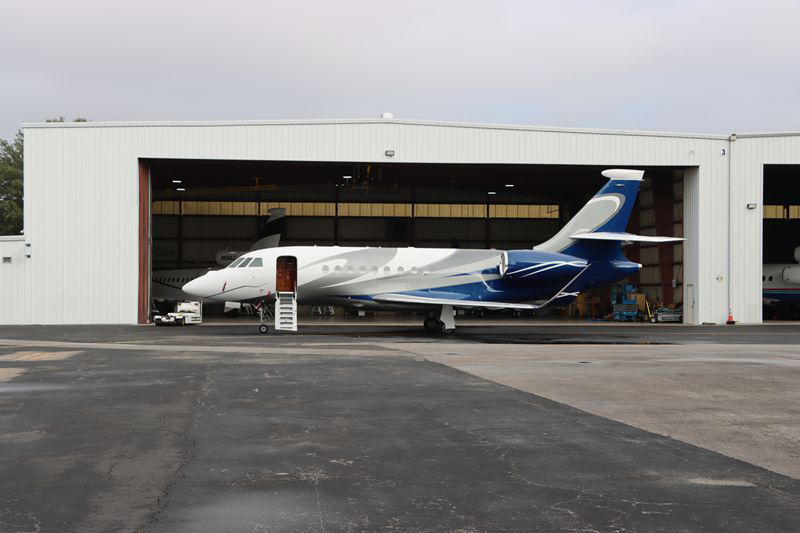Private jet in hangar door
